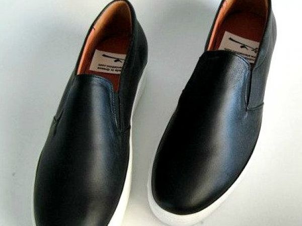 Black leather slip on shoes